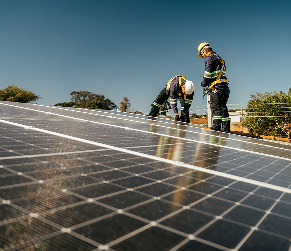 Commercial solar installers installing solar panels